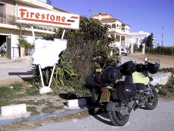 R1100GS with an old Firestone advertisement board