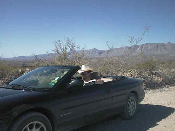 Ernst in a Chrysler convertablee
