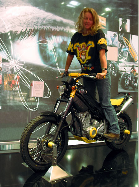 Sylvia standing on a Yamaha Tricker