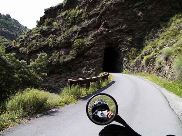 Photographer in a mirror,in front of a tunnel